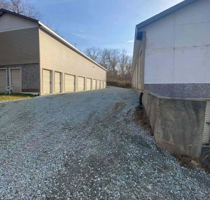 Smooth top layer in front of the house with basement after finishing grading.